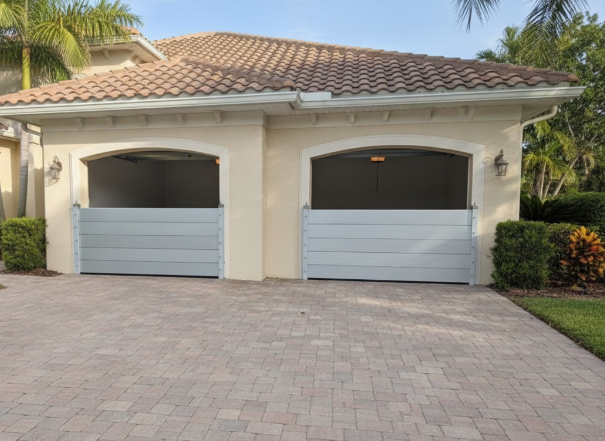 Two-car garage with aluminum flood barriers installed