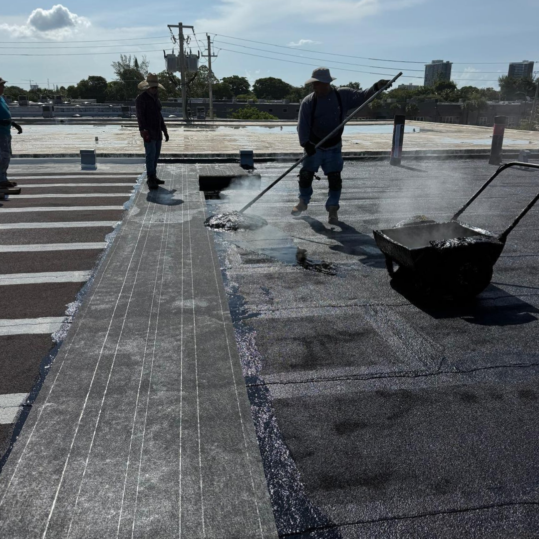 Hot-mop application on a flat roof